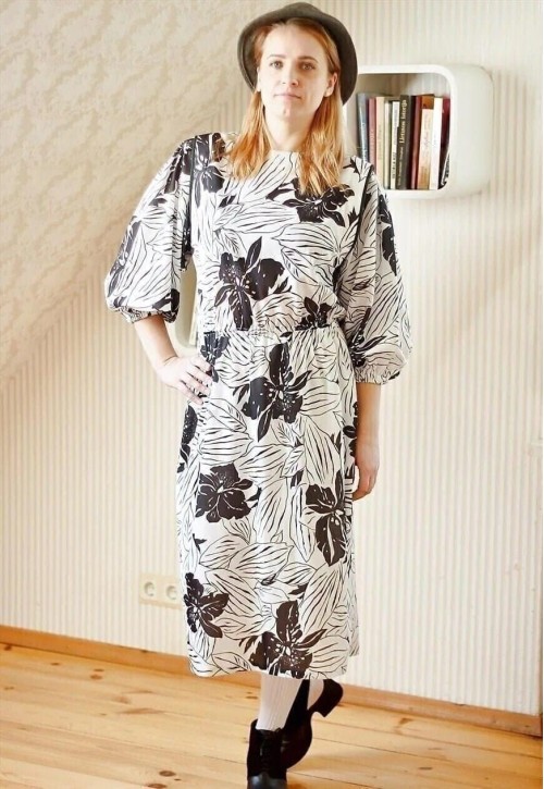 White vintage dress with black flowers and shoulder pads