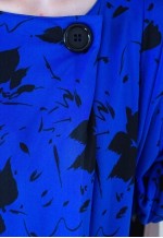 Bright blue long sleeve dress with black flowers