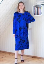 Bright blue long sleeve dress with black flowers